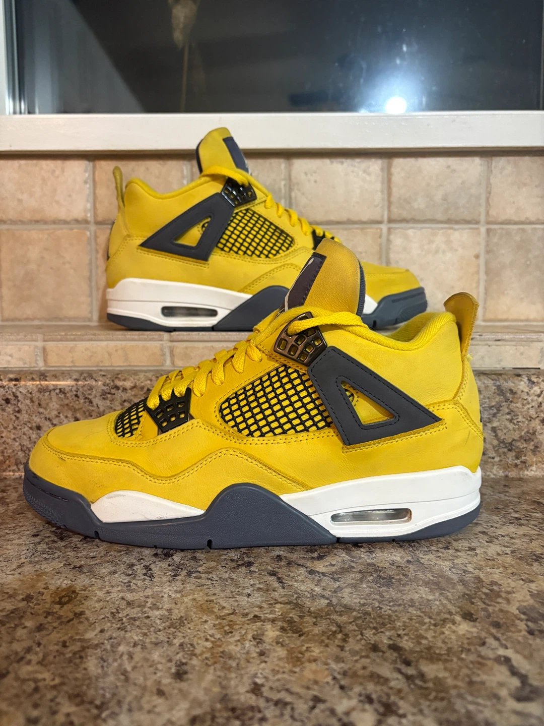 Air Jordan 4 "Lightning" Yellow Sneakers