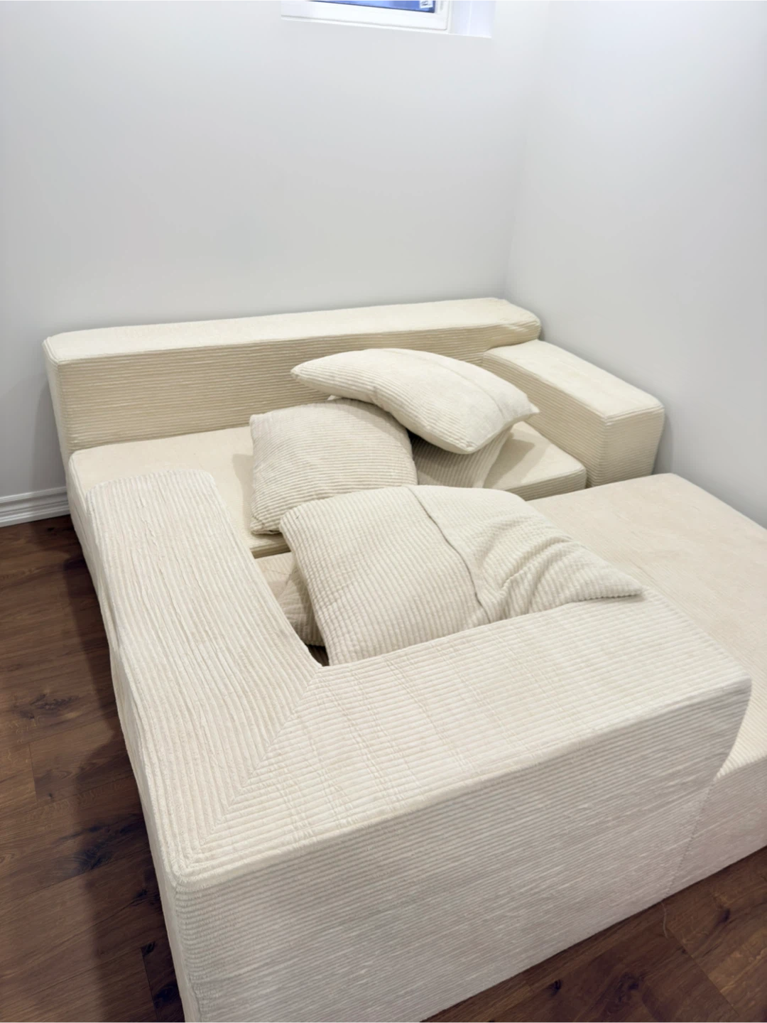 Cream Corduroy Sectional Sofa with Pillows