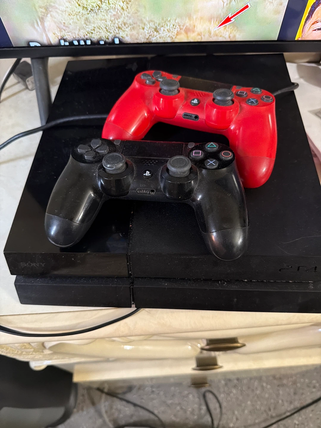 Sony PlayStation 4 Console with 2 Controllers
