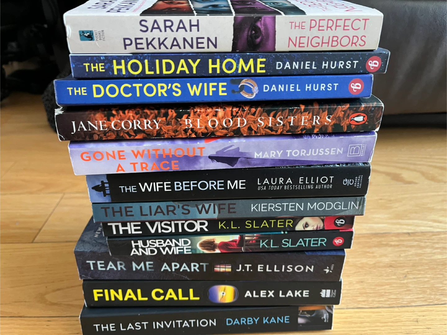 Various thriller and romance books and Archie comic book