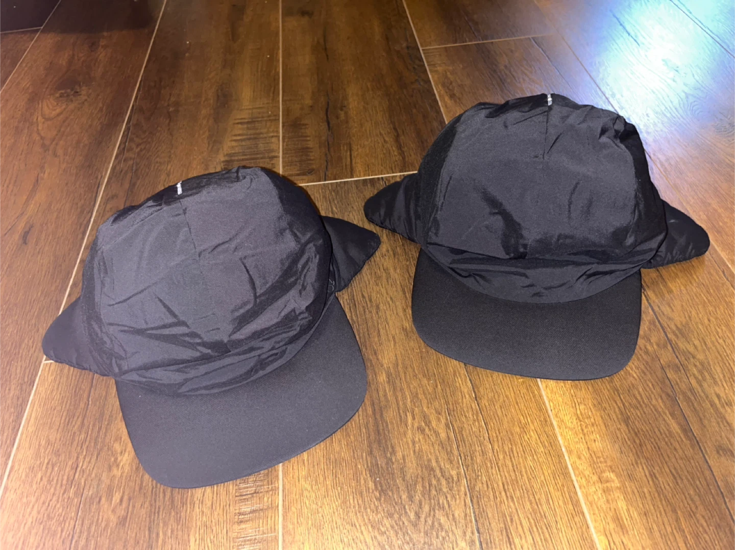 His / Hers Lululemon PrimaLoft trapper hats