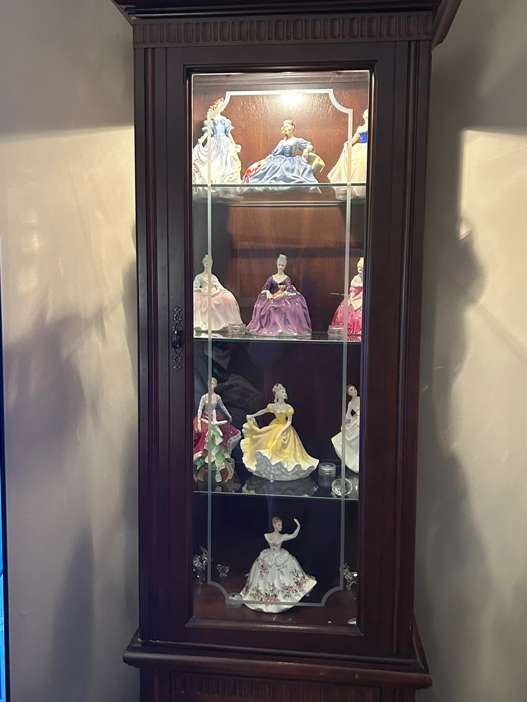 Corner Display Cabinet with Figurines