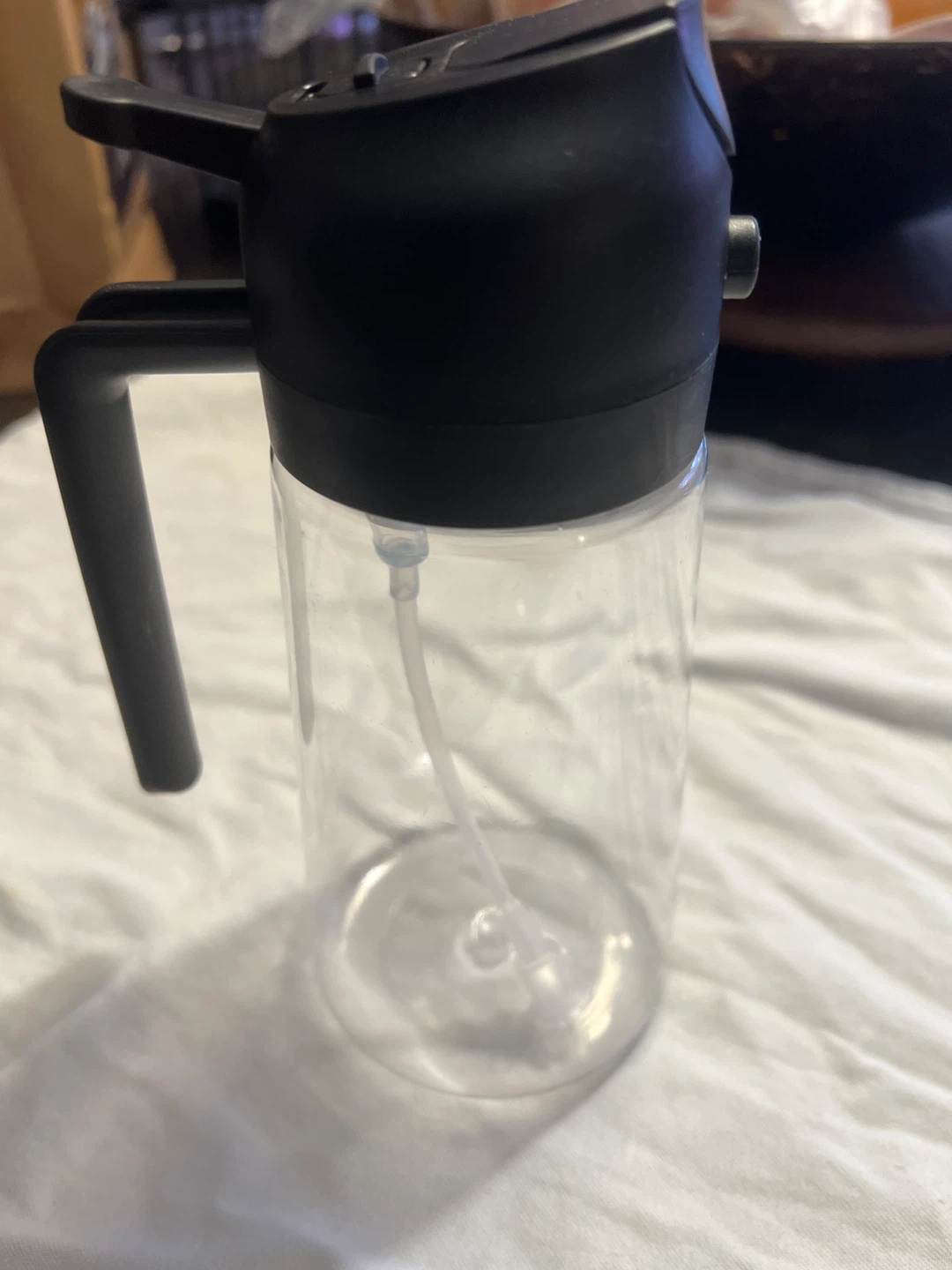 Clear Spray Bottle with Black Handle