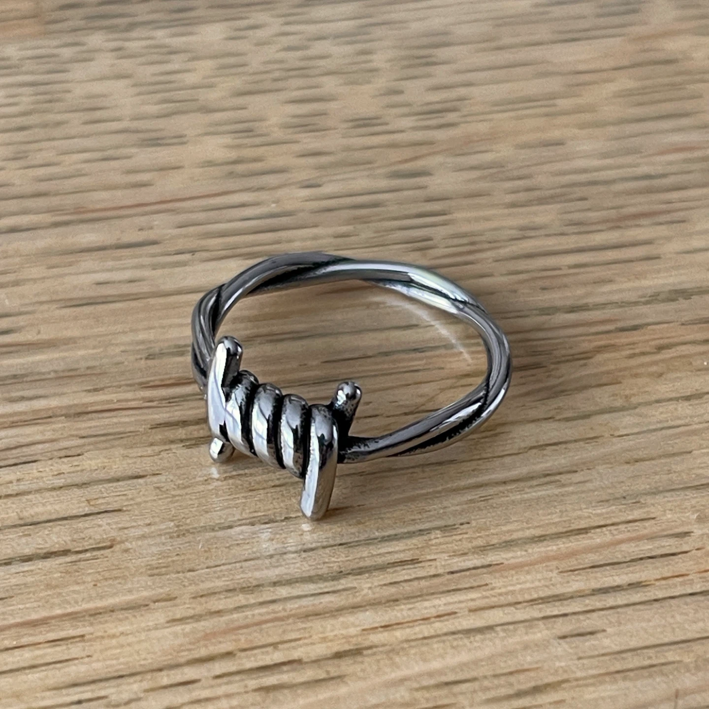 Twisted “barbed wire” titanium ring (size 10)
