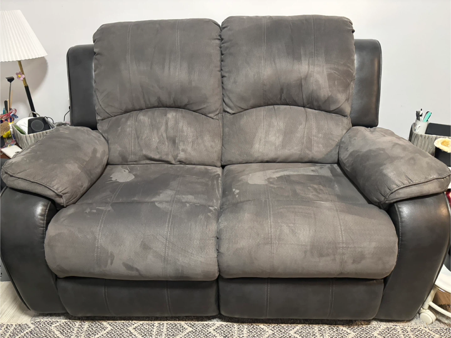 Gray 2 seater reclining sofa/clean and in good condition