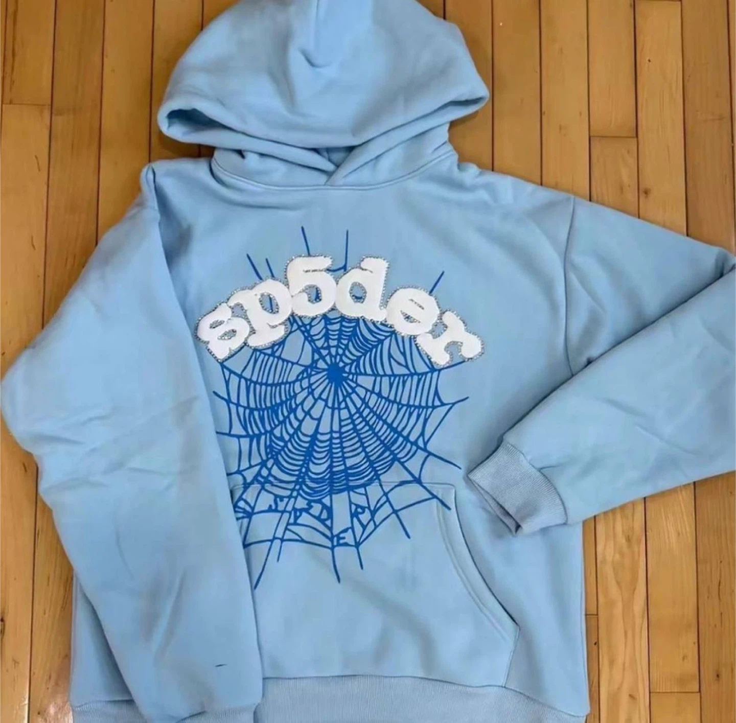 Sp5der Sky Blue Rhinestone Web Hoodie – All Sizes