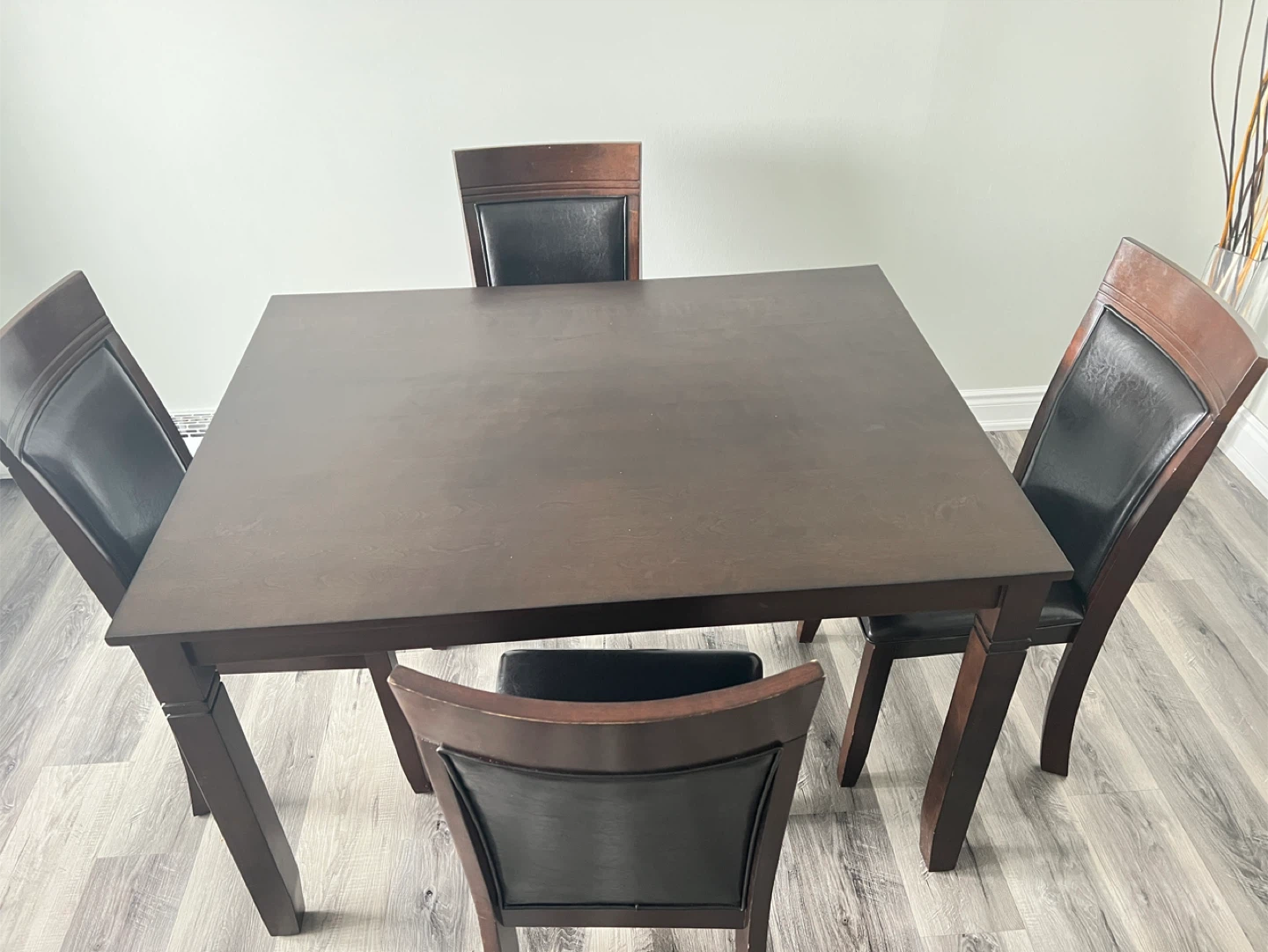 Dark Solid Wood Dining Table with 4 Black Faux Leather Chairs
