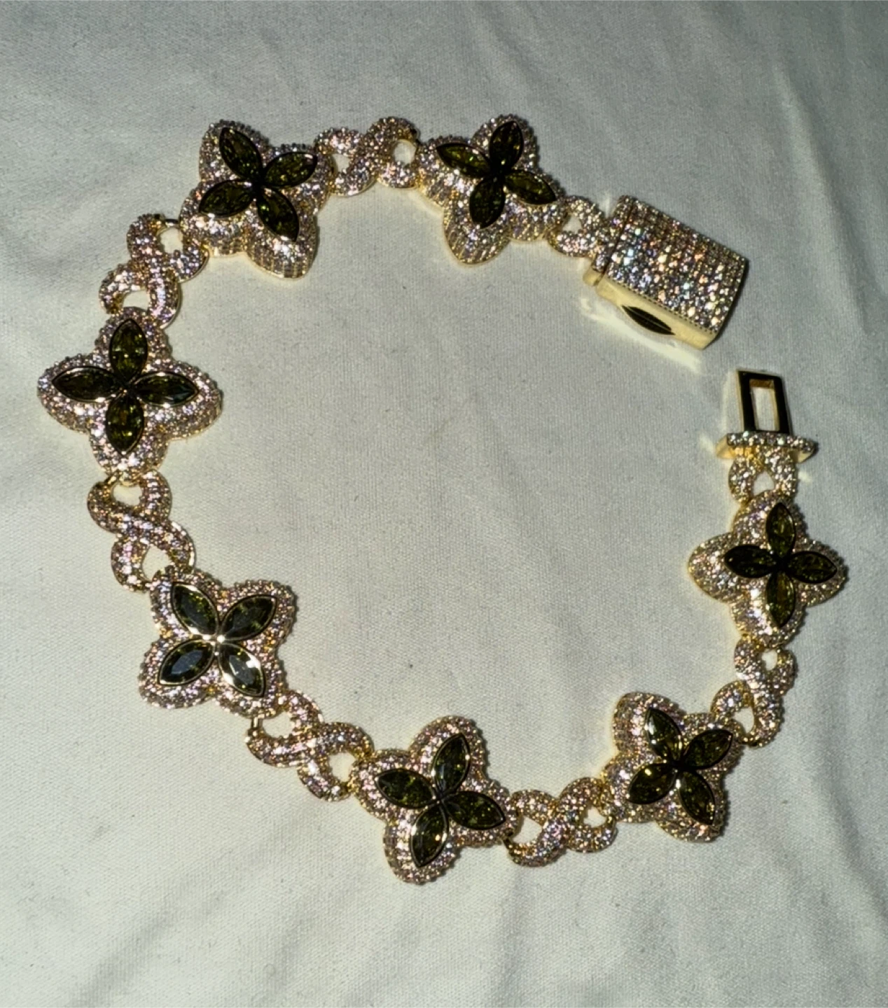 Gold Tone Clover Bracelet with Green and White Stones