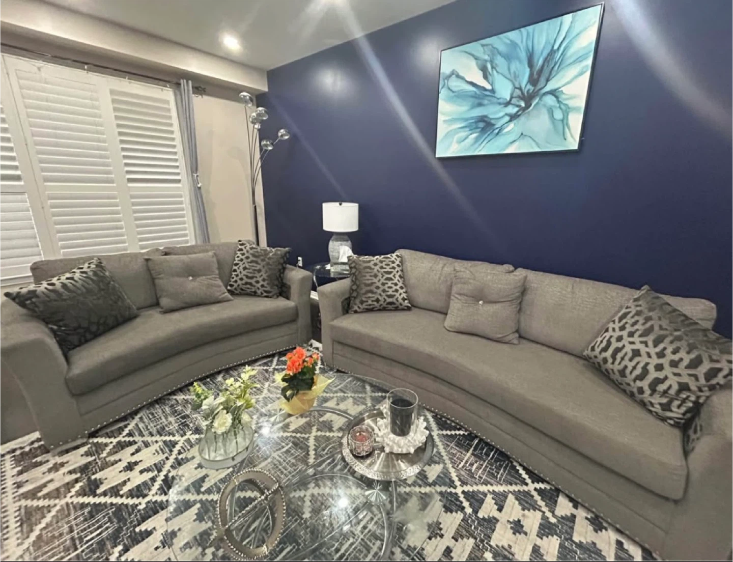 Grey Fabric Curved Sofa with Accent Pillows