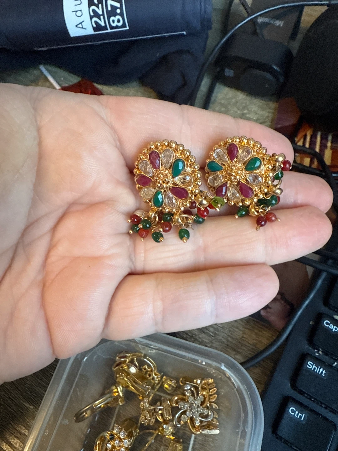 Gold tone earrings with coloured beads