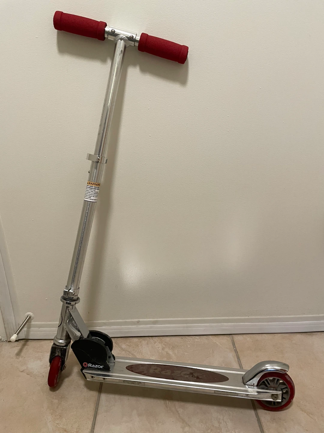 Razor Scooter with Red Grips