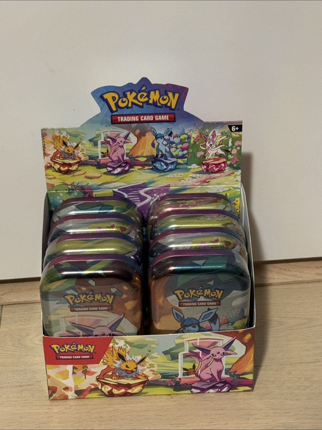 Prismatic evolution mini tin display full set