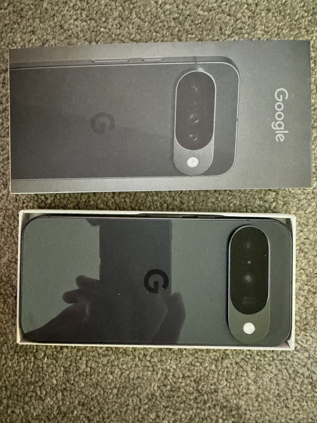 Google Pixel 10 phone with charger and screen protector