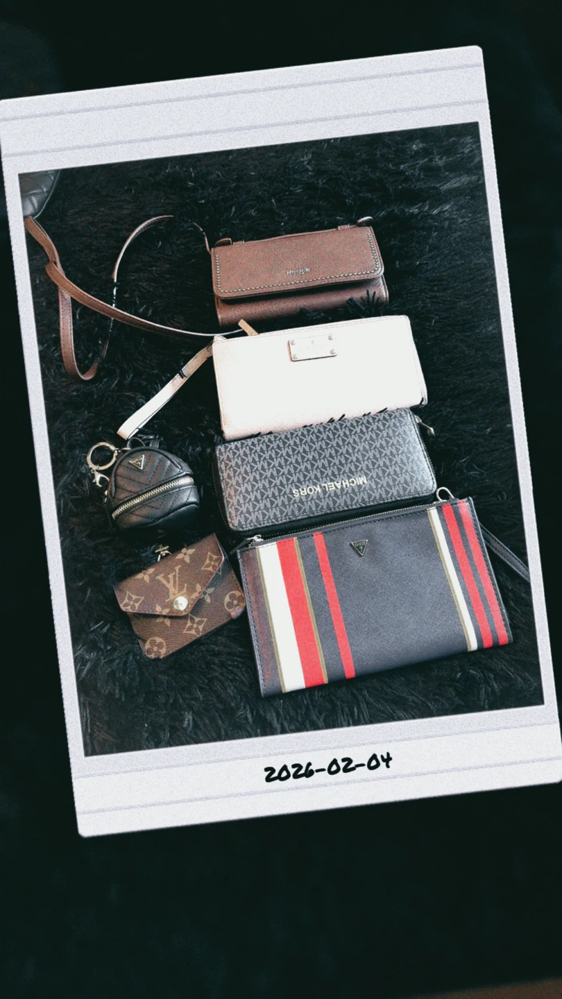 Assorted designer wallets and coin purses