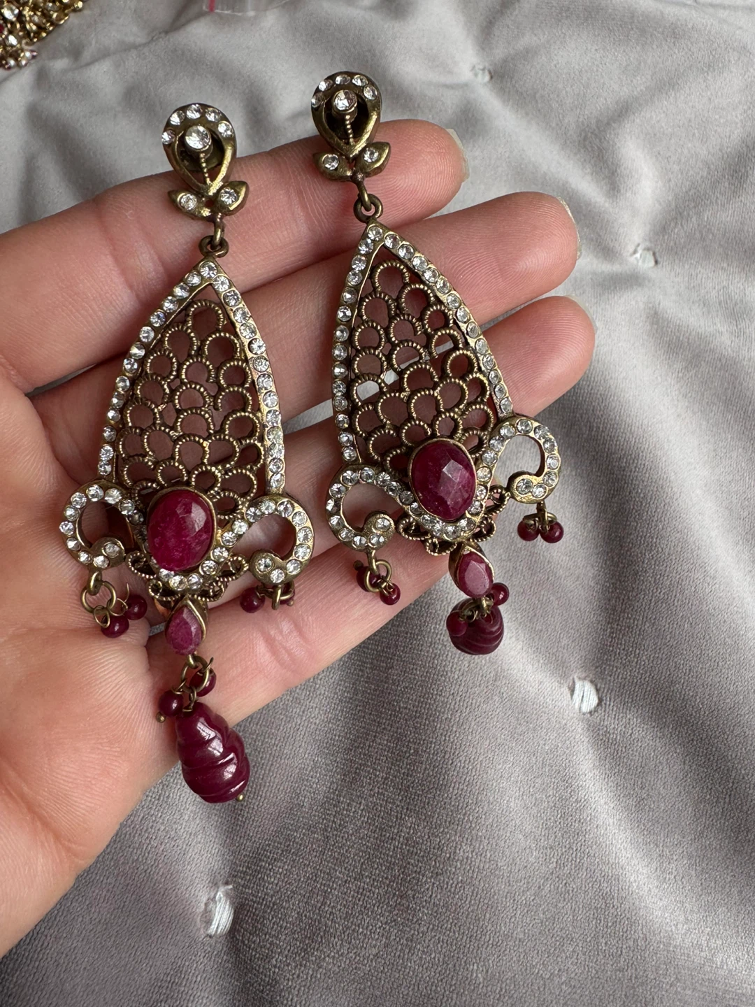 Ornate Gold-Tone Dangle Earrings with Red Stones and Crystals