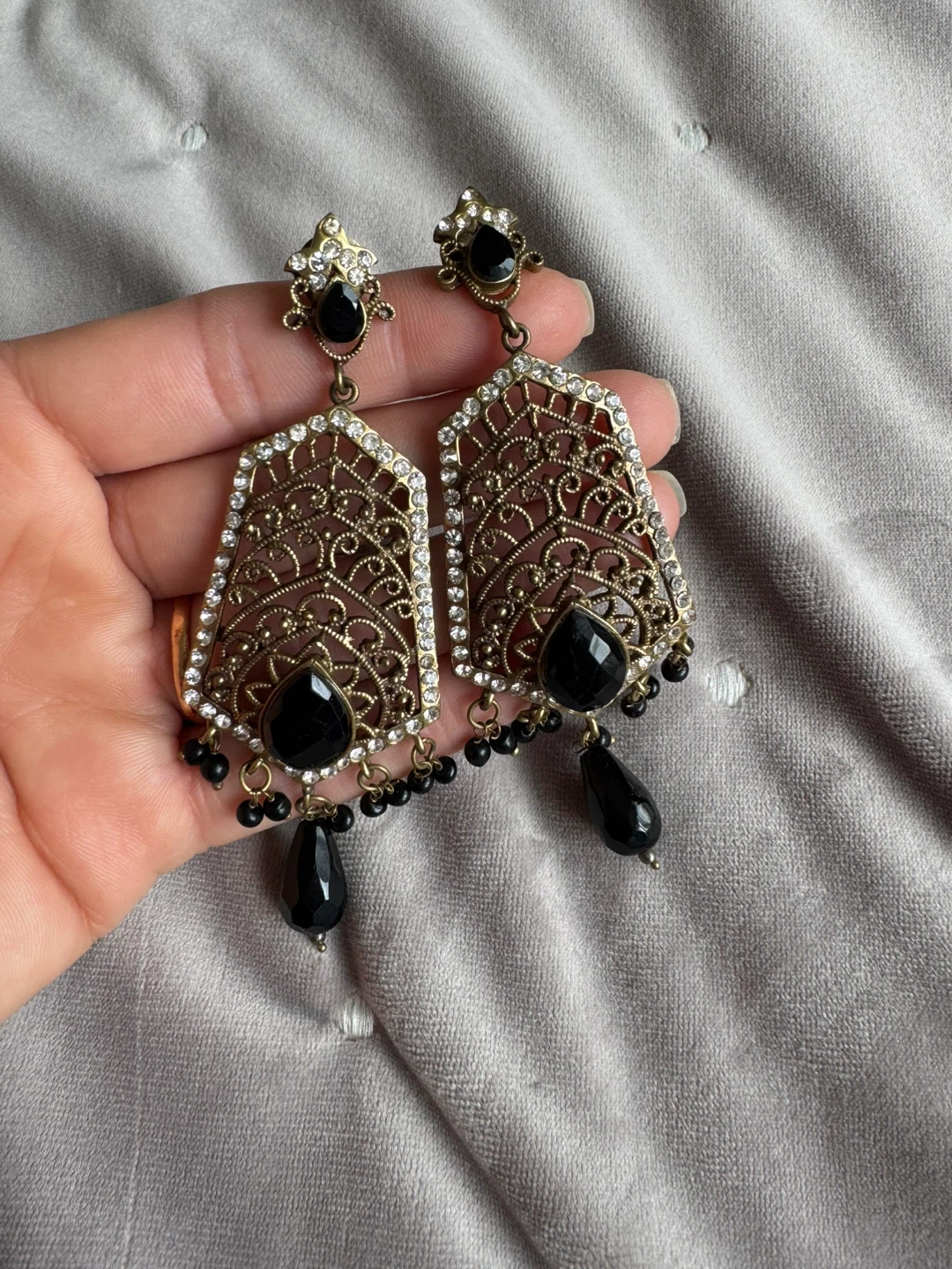 Gold Tone Filigree Dangle Earrings with Black Gems