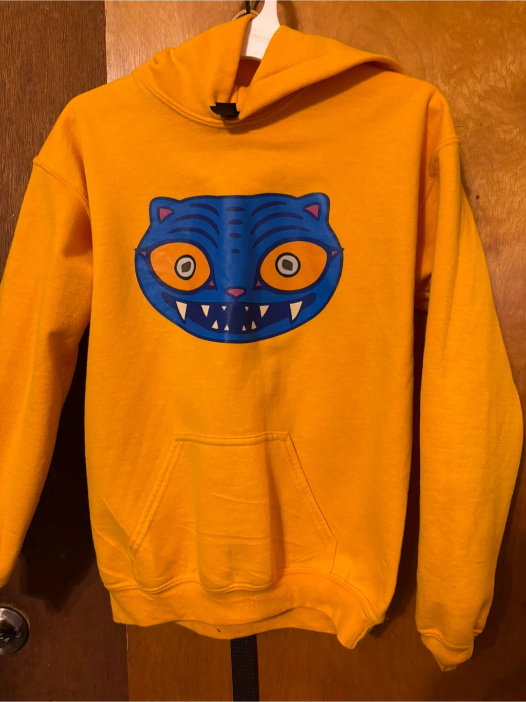 Yellow Hoodie with Blue Cat Face Graphic