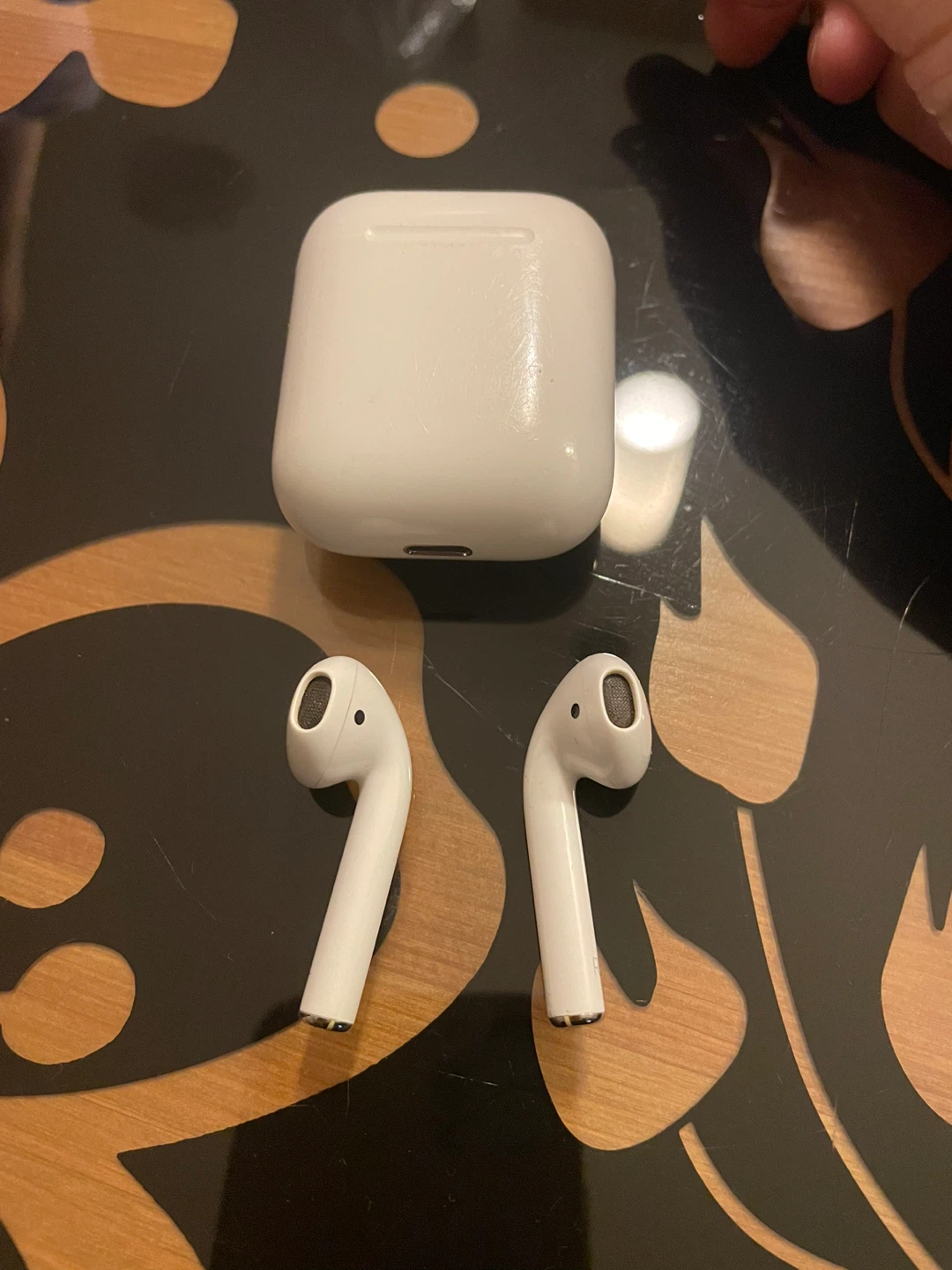 Apple AirPods (1st Gen) Wireless Earbuds with Charging Case - photo 2