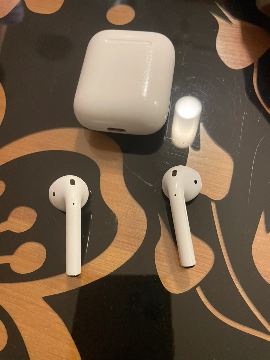 Apple AirPods (1st Gen) Wireless Earbuds with Charging Case - photo 3