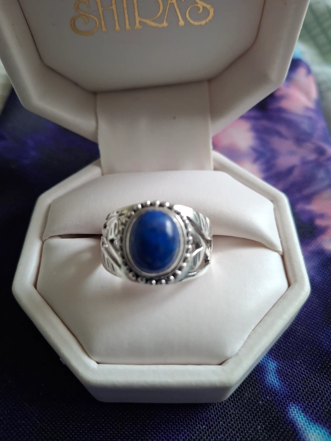 Silver ring with blue stone (stamped 925)