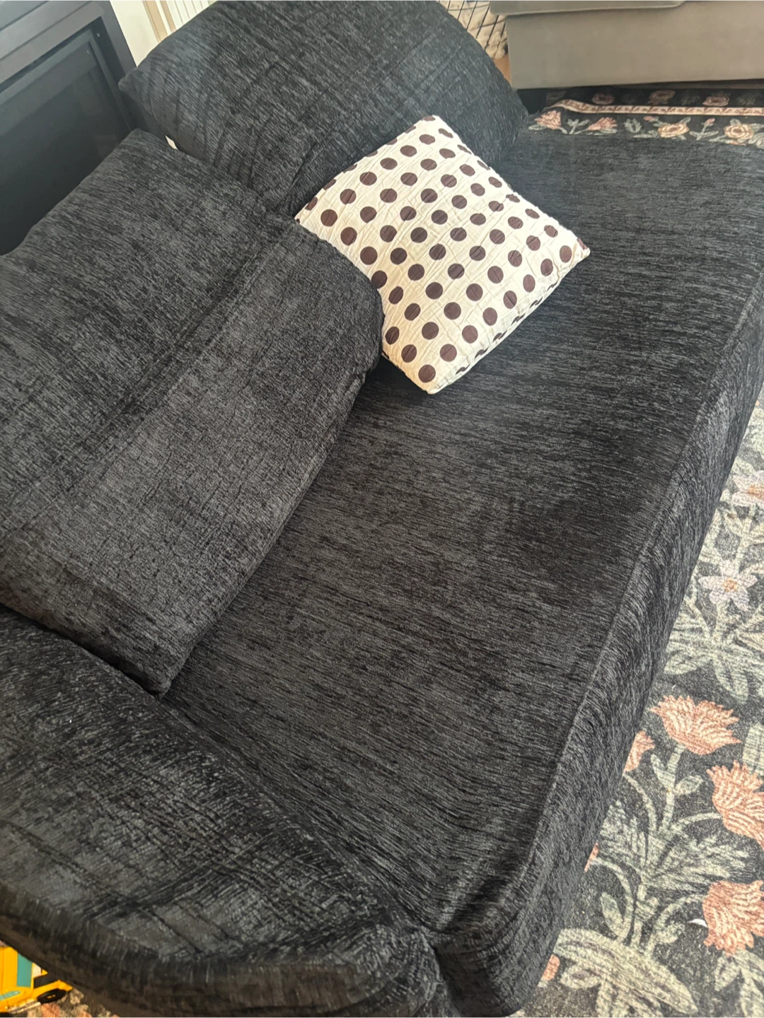 Black textured couch with  pillow - photo 4