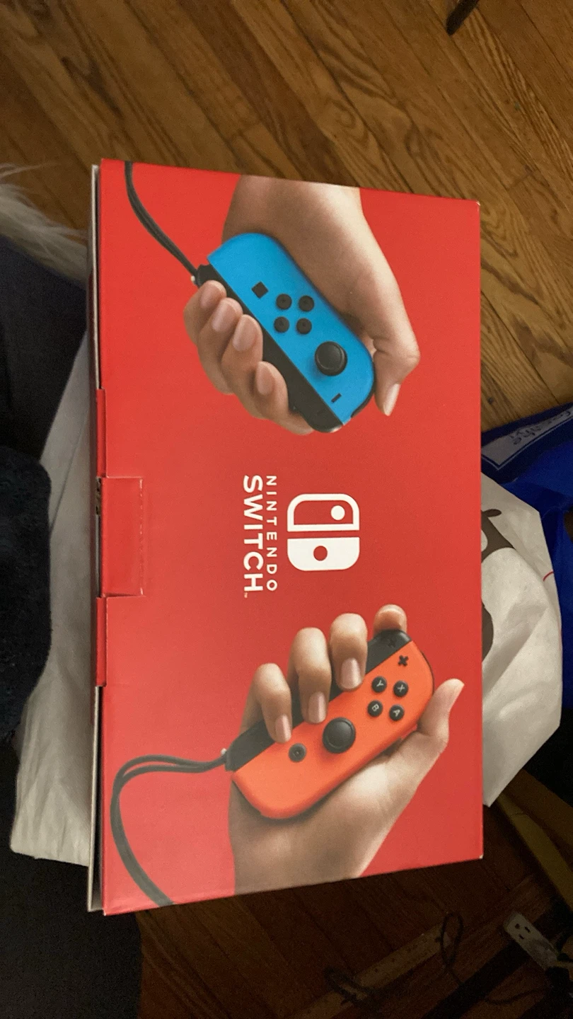 Nintendo Switch Console with Blue and red Joy-Cons
