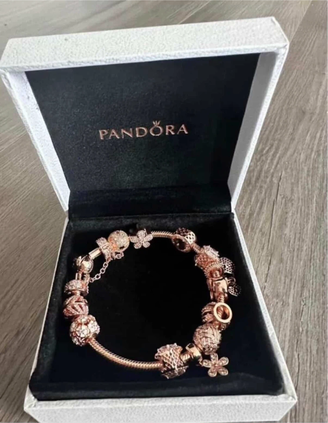 Pandora Rose Gold Charm Bracelet with Multiple Charms