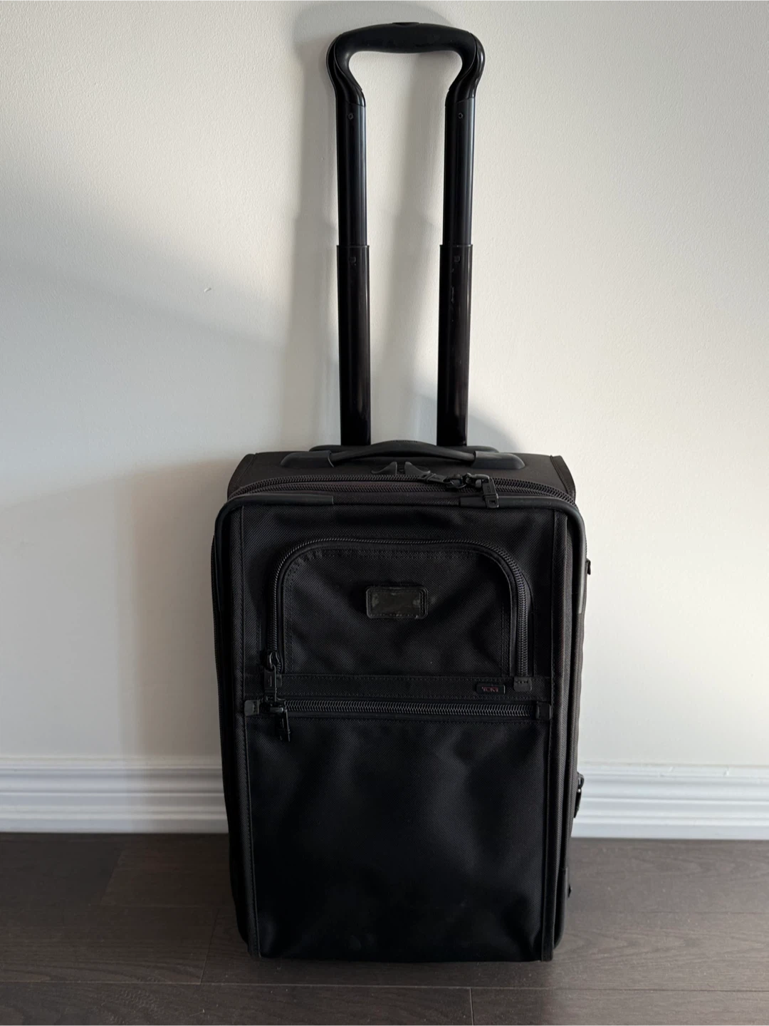 Tumi Black Rolling Suitcase