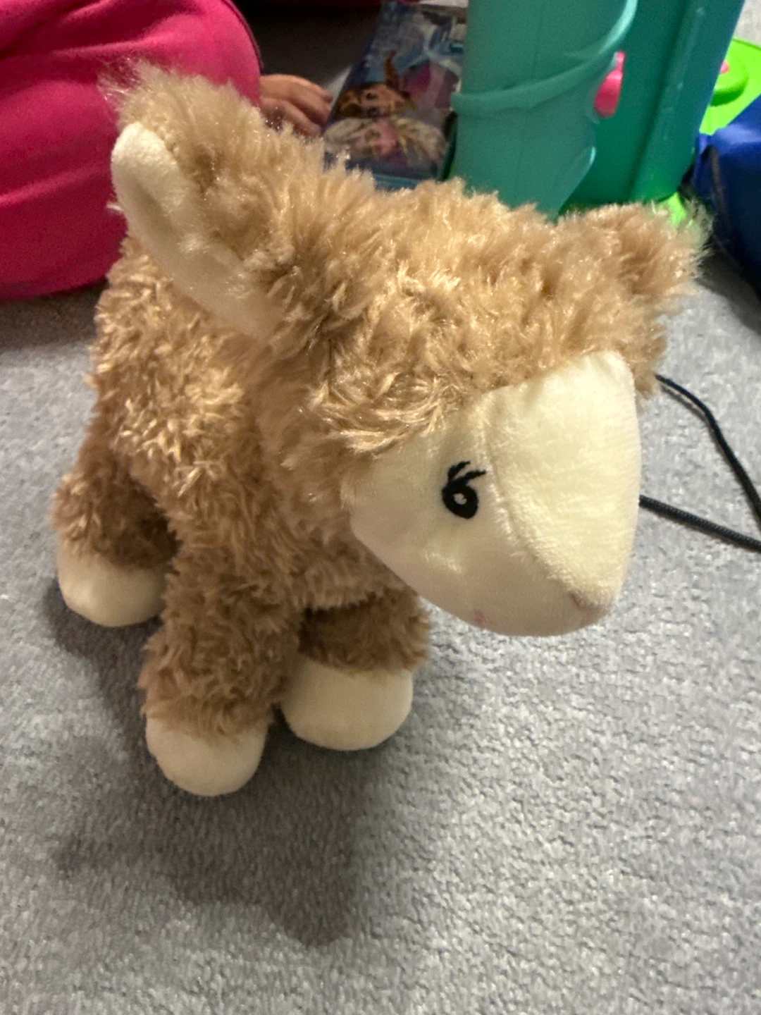 Brown fluffy stuffed animal lamb