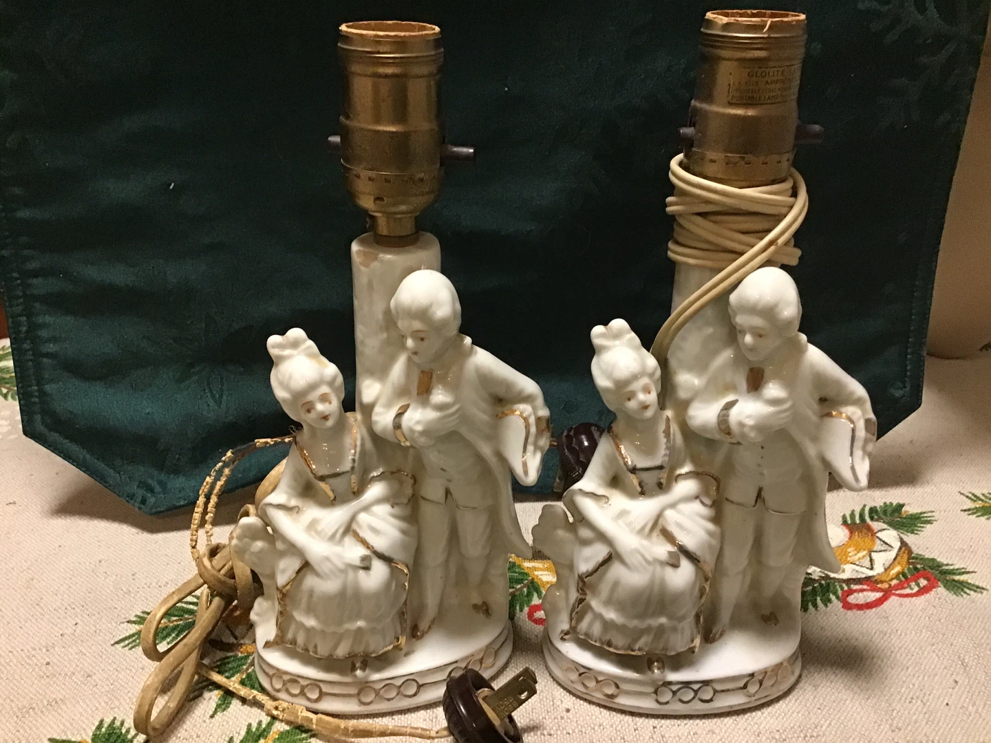 A vintage porcelain lady and man lamp base