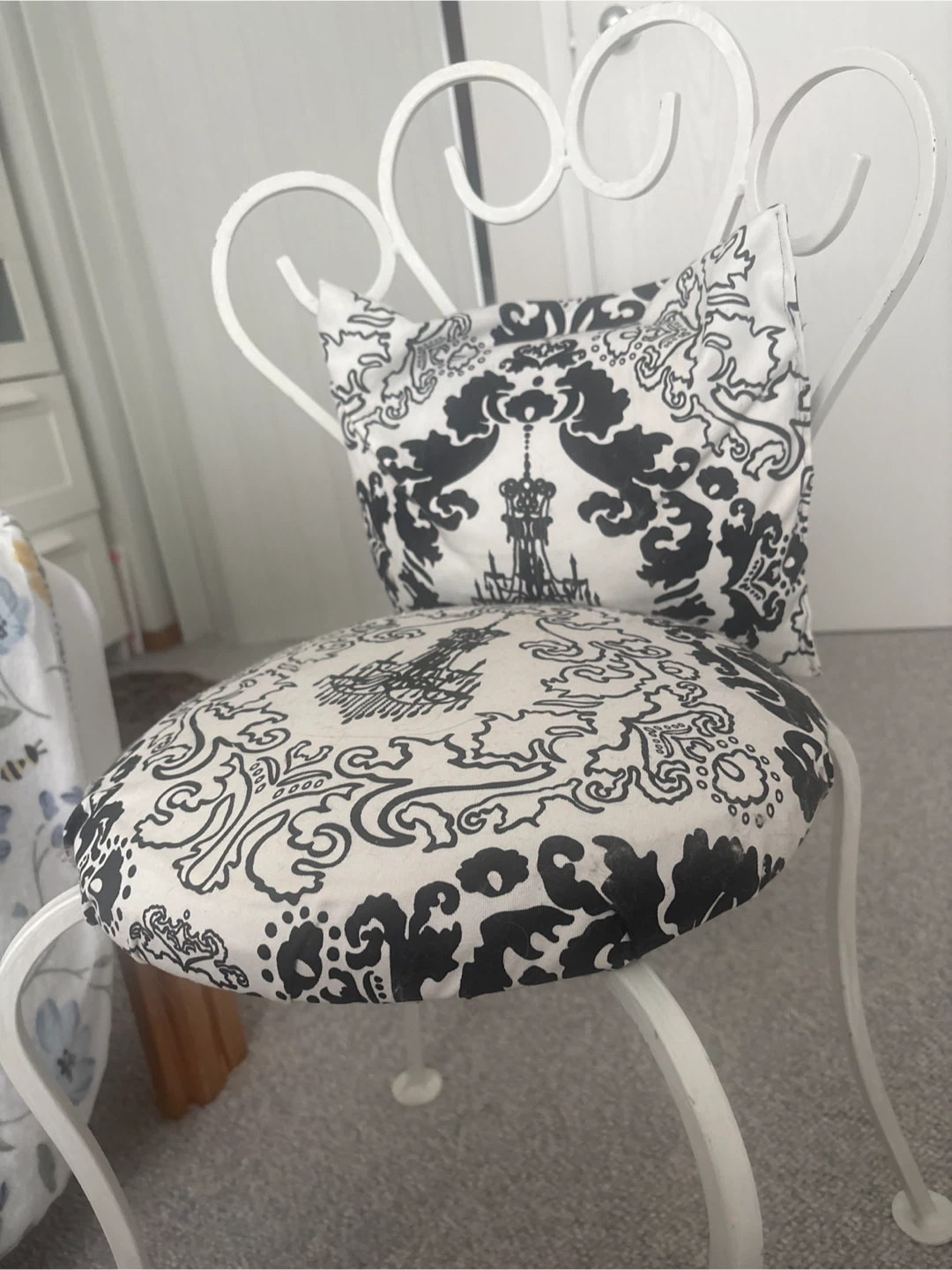 White Metal Vanity  White Patterned Cushion and Pillow