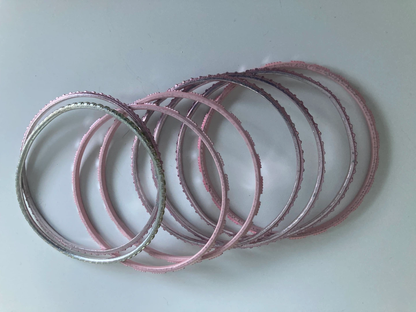 Set of 9 Pink and Silver Bangles
