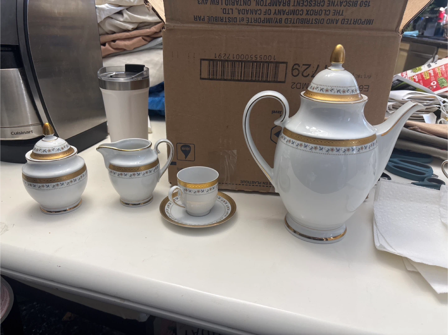 White and Gold Teapot, Sugar Bowl, Creamer, and Cup Set