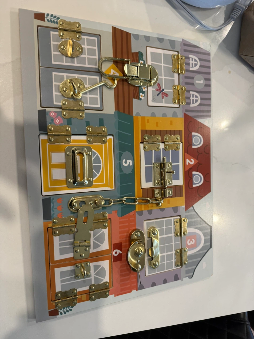 Wooden Activity Board with Locks and Latches - photo 2