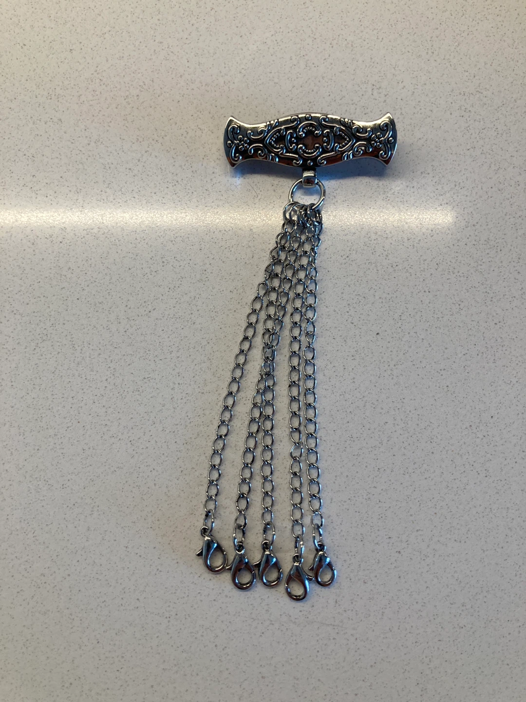 Silver Decorative Brooch with Dangling Chains