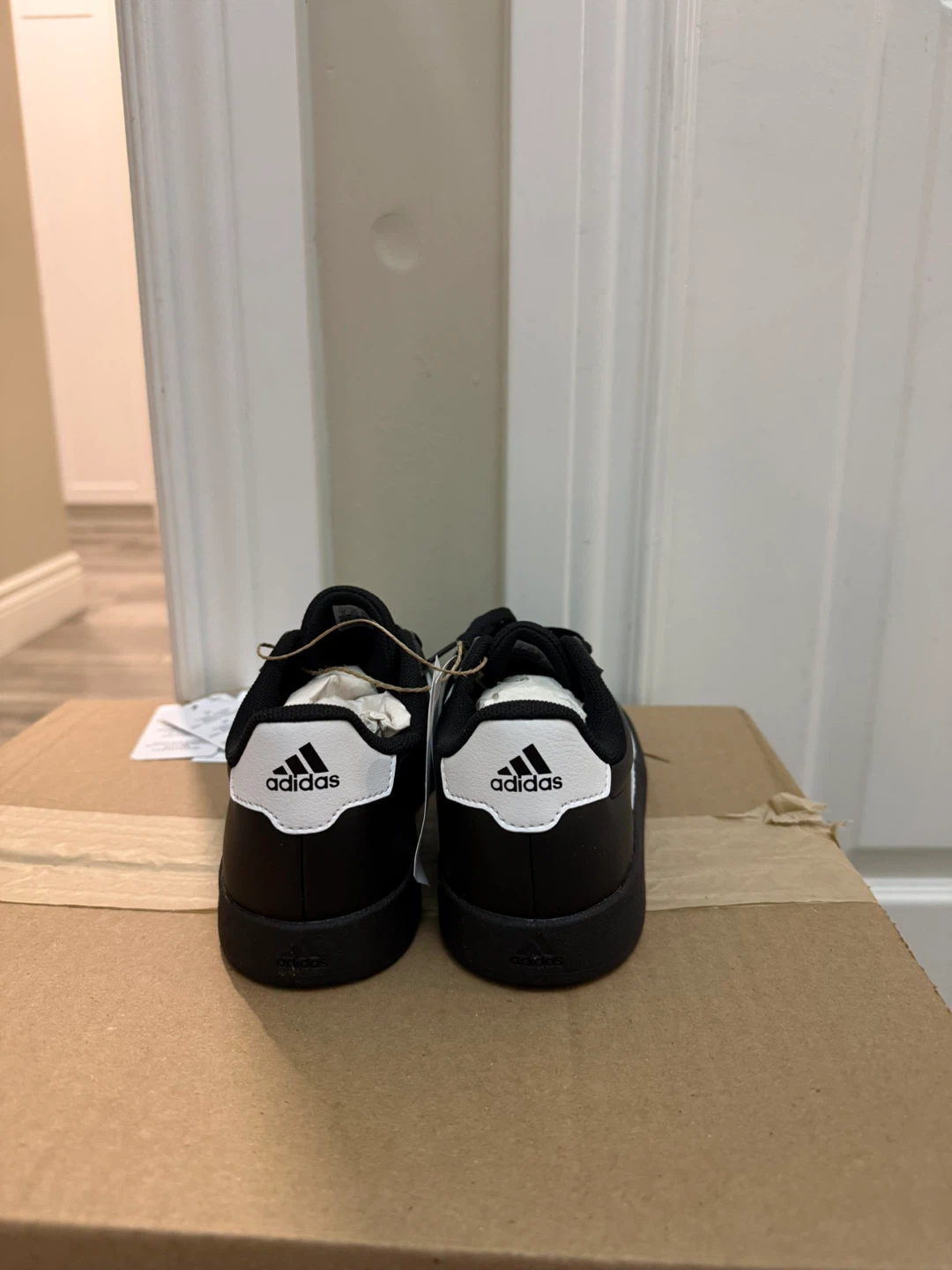 Adidas Black Sneakers with White Stripes - photo 2