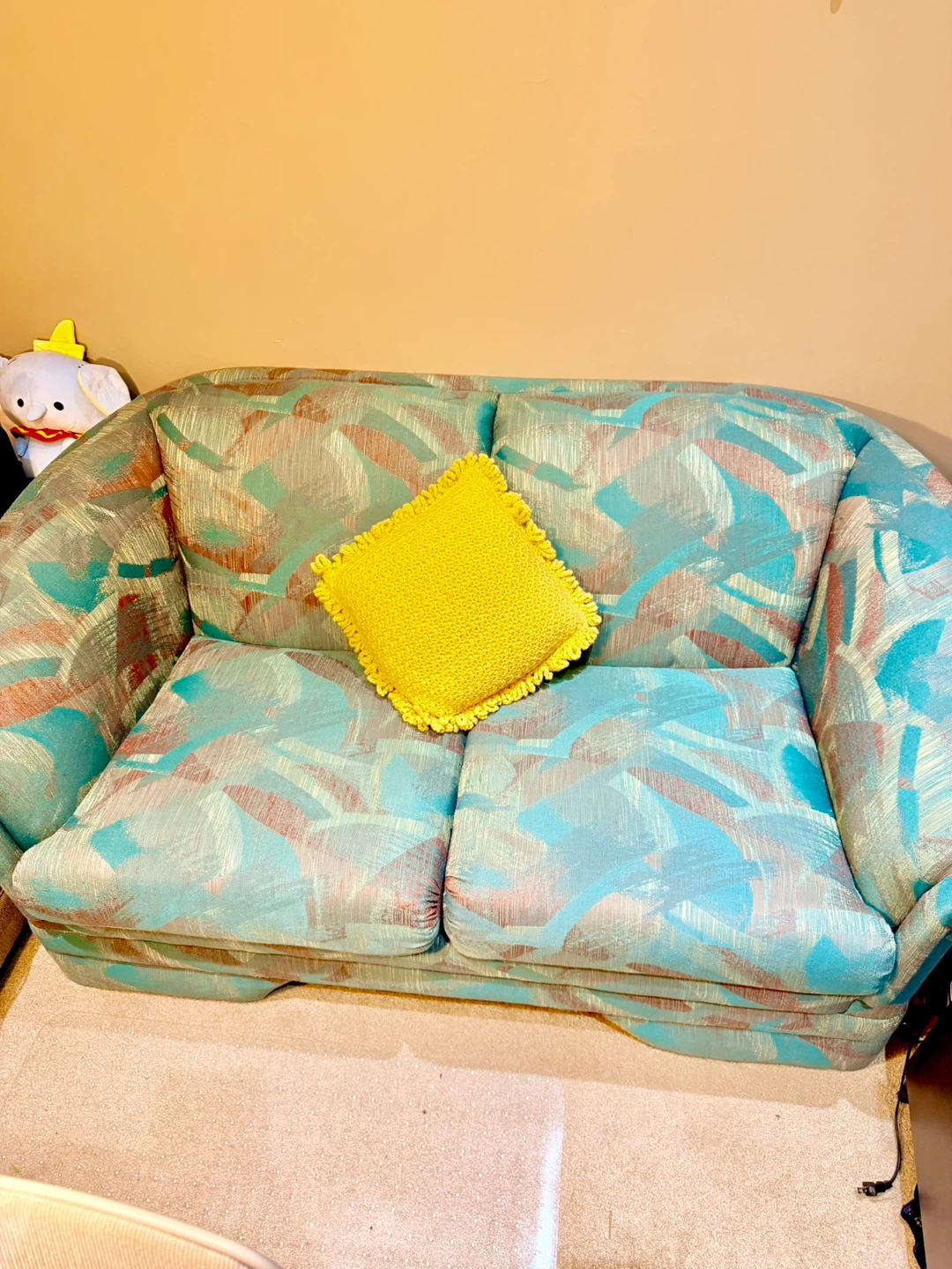 Two-seater couch with abstract pattern