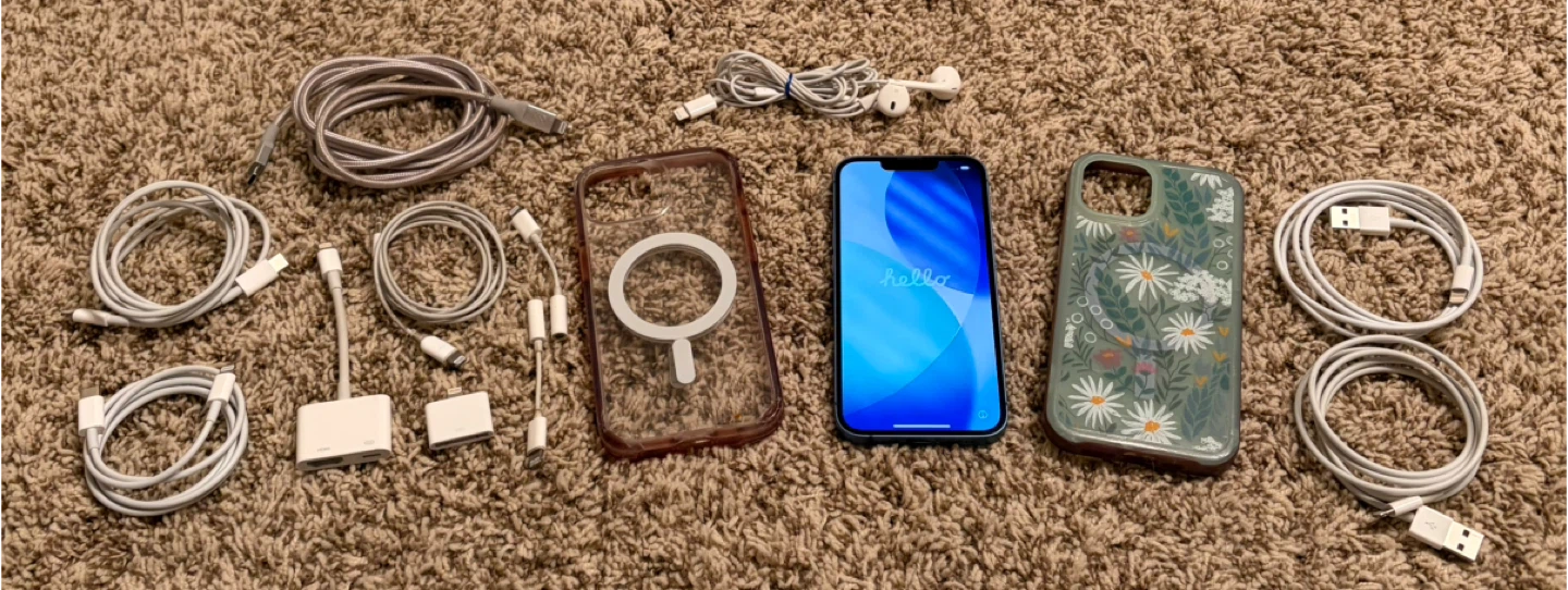 Blue iPhone 13 with accessories - photo 2