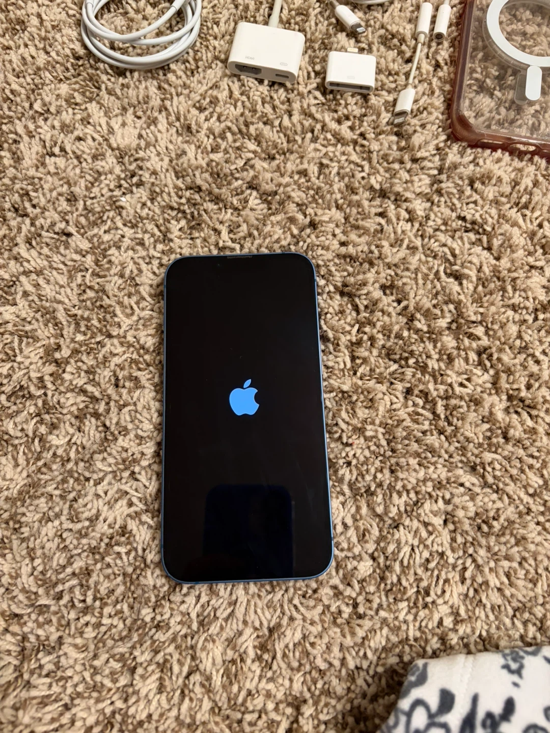 Blue iPhone 13 with accessories - photo 3