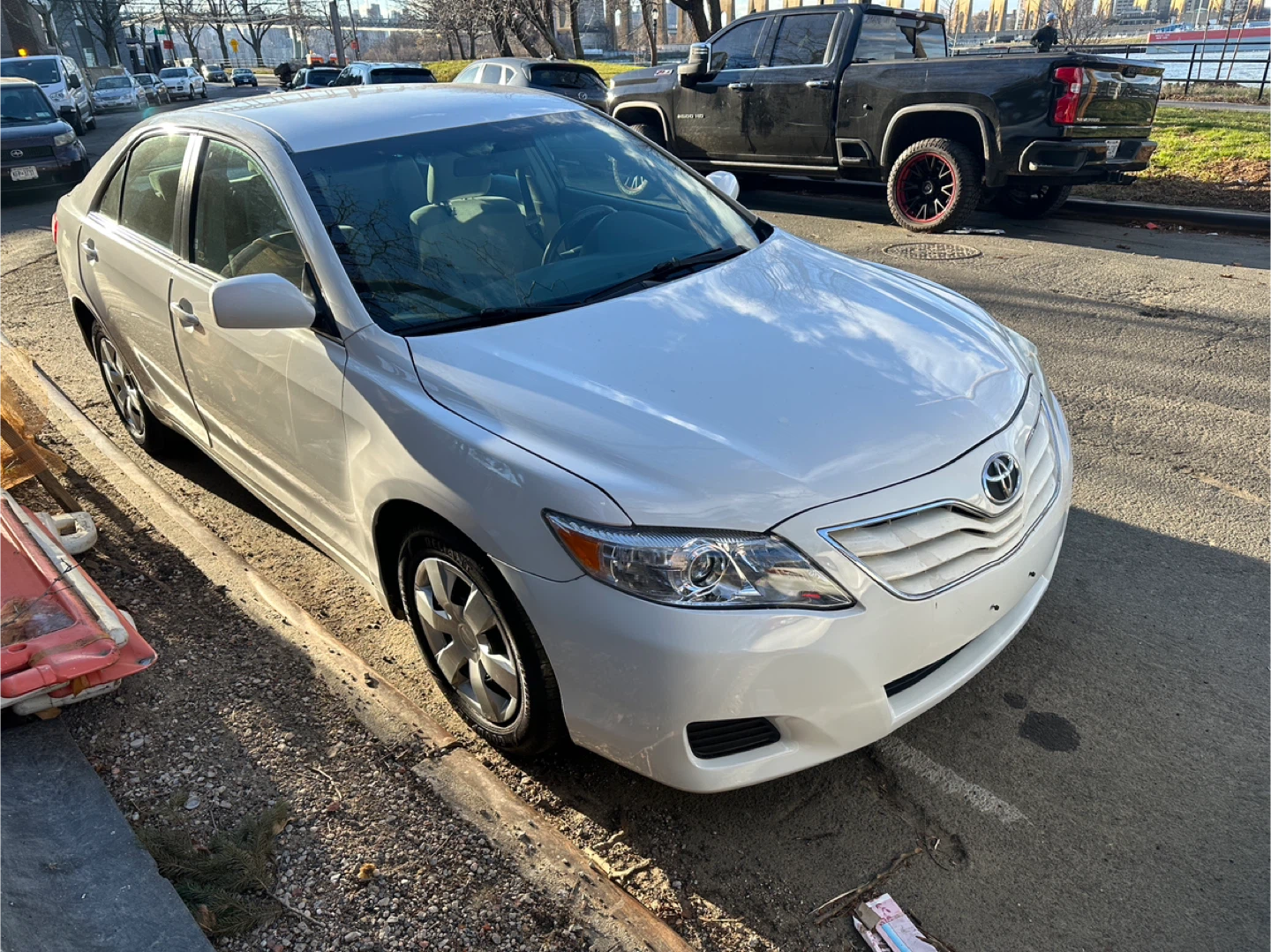 White Toyota Camry LE Sedan