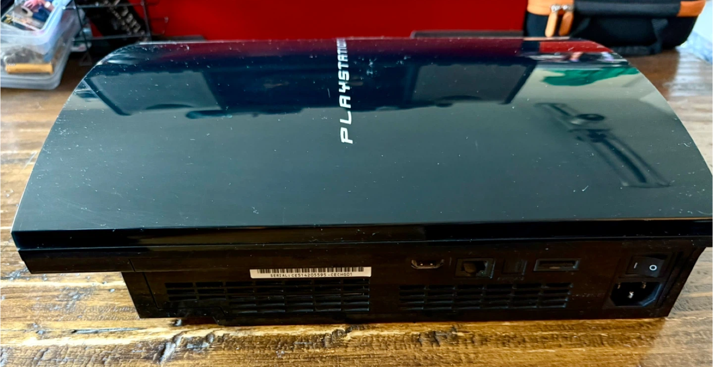 Sony PlayStation 3 (PS3) with 2 Controllers and Remote - photo 3