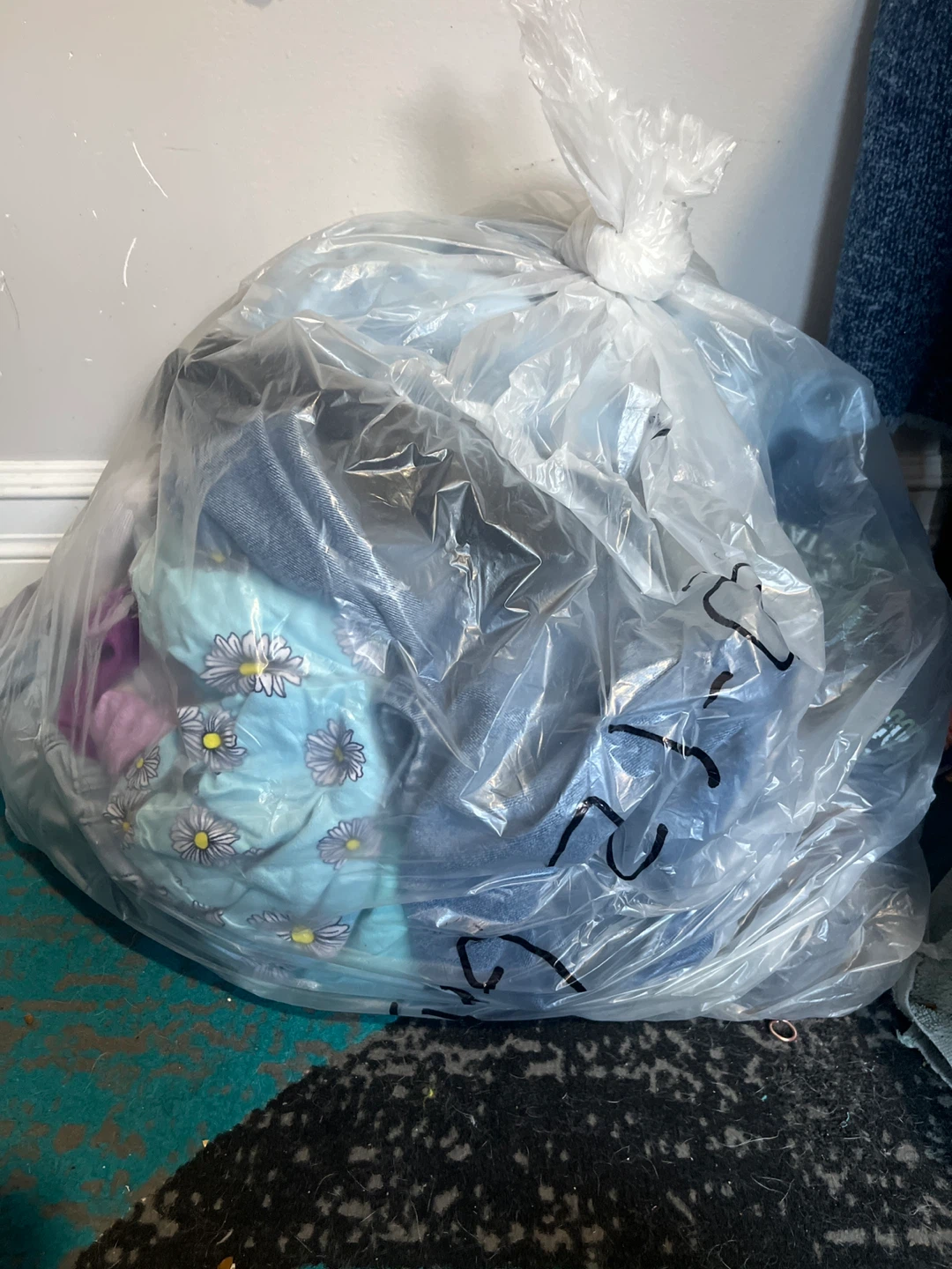 Bag of assorted children's clothing