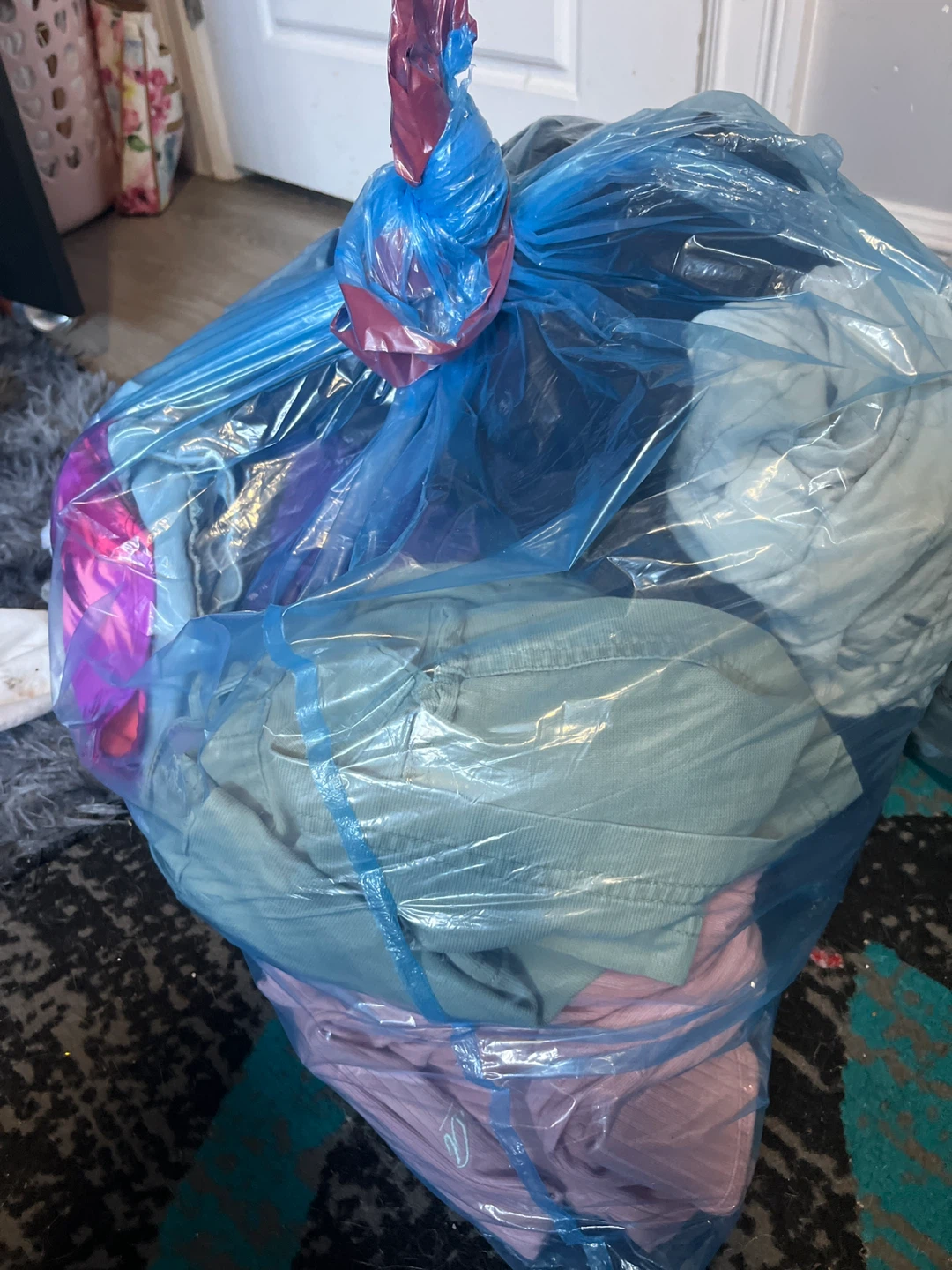 Bag of assorted women's clothing