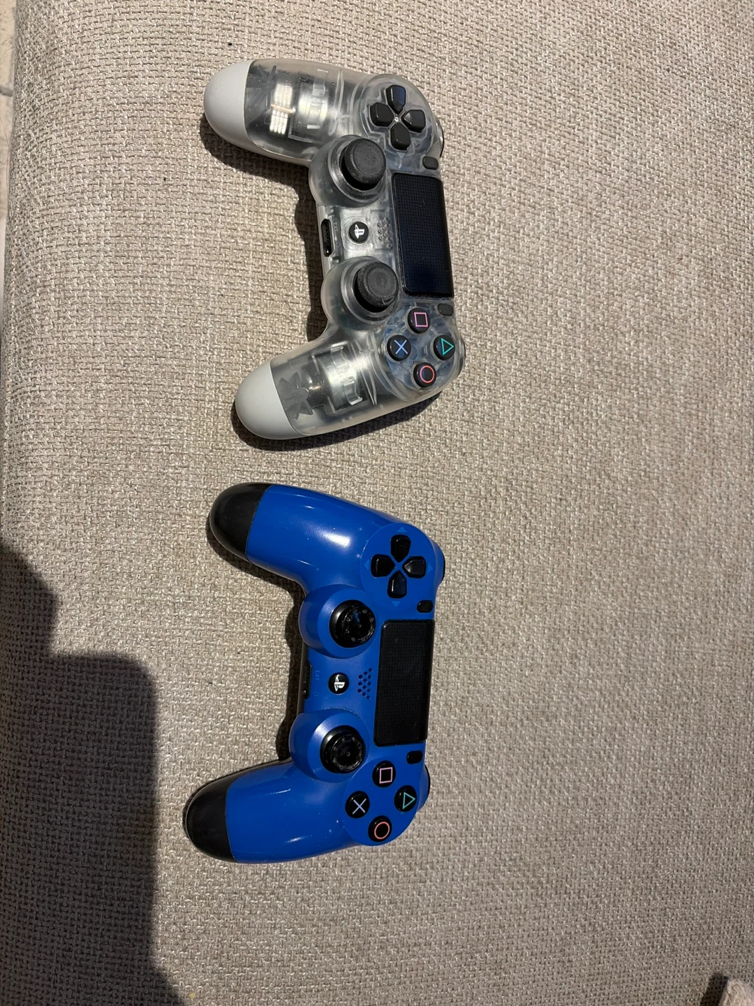 2x Sony PlayStation DualShock 4 Controllers (Clear & Blue)