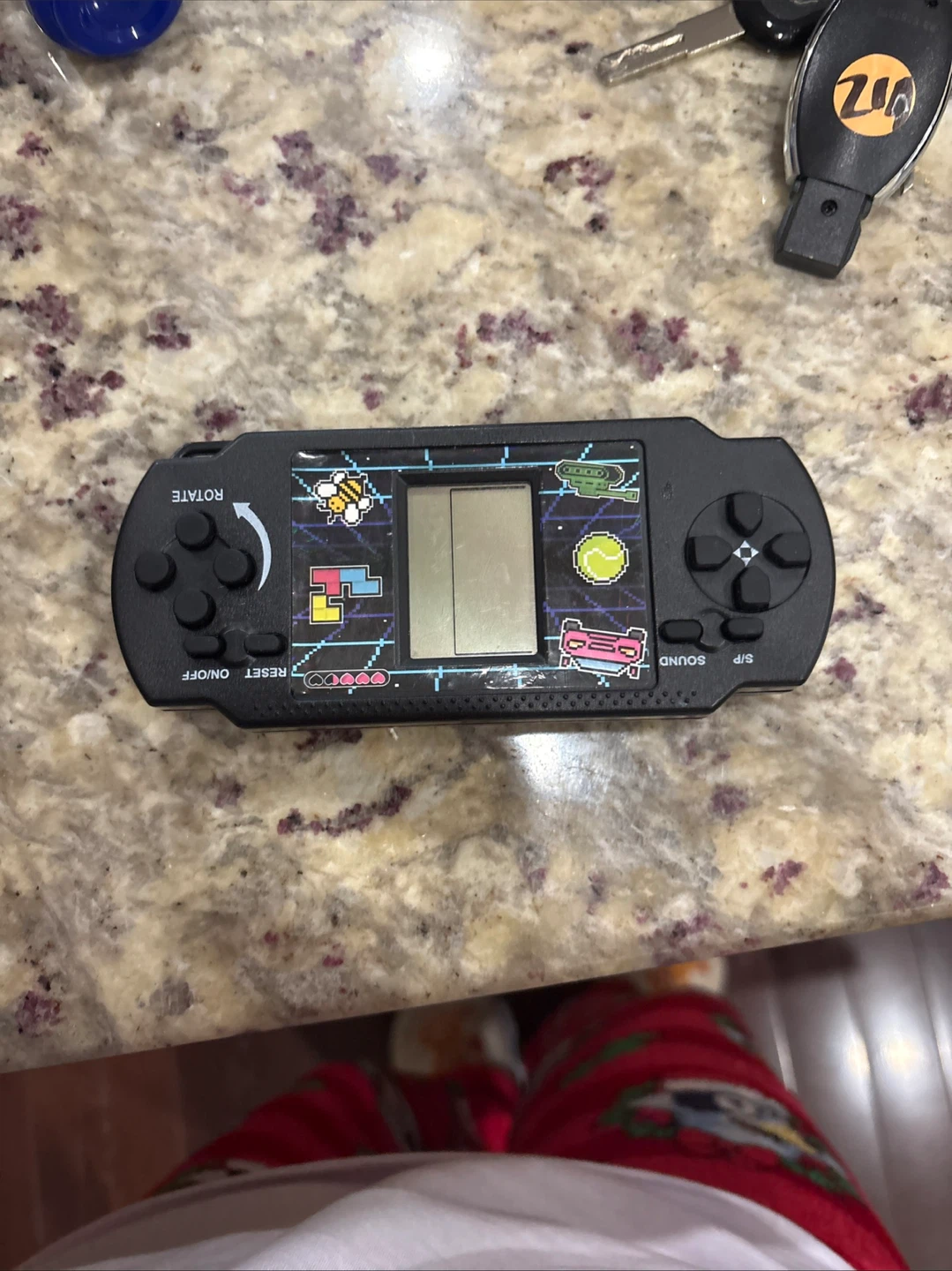 Black Handheld Electronic Game Device