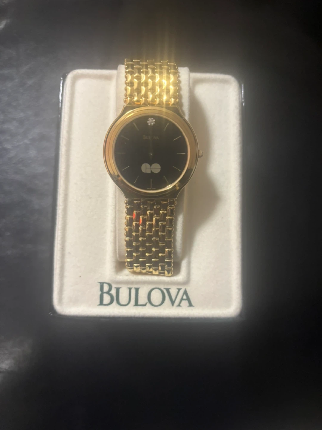 Bulova Gold Tone Watch with Black Dial