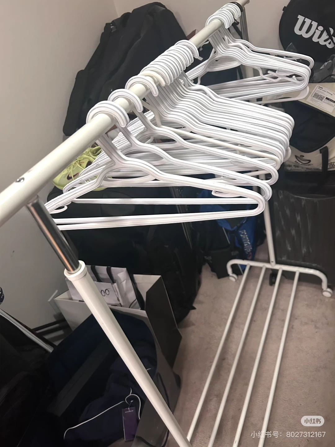 Set of White Plastic Clothes Shelf and Hangers