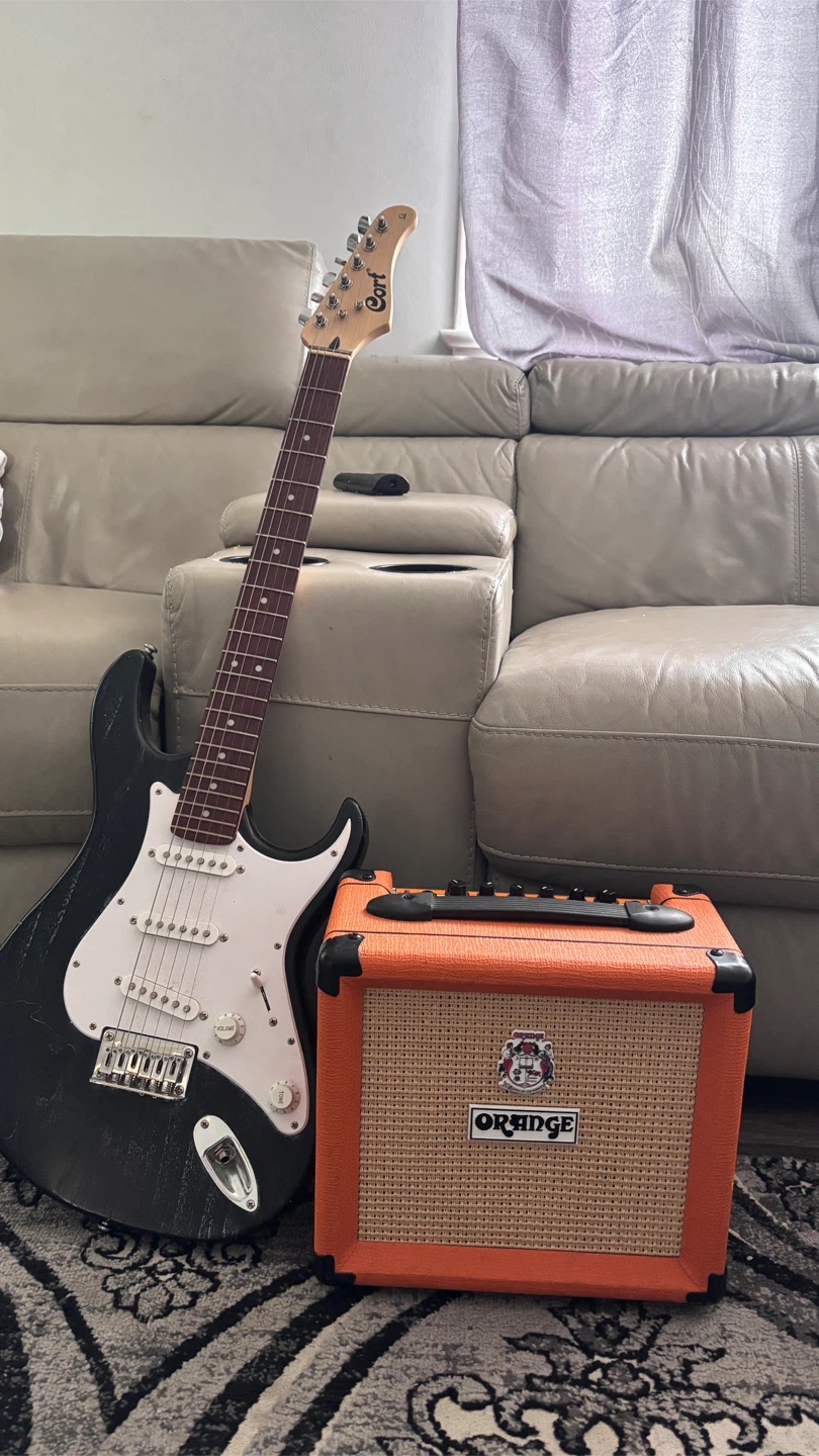 Cort Electric Guitar with Orange Amp with Guitar stand.