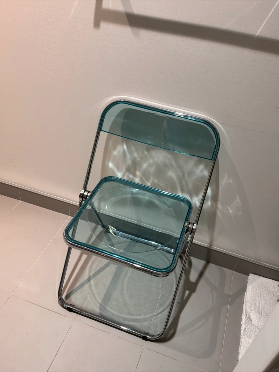 Transparent Teal Folding Chair