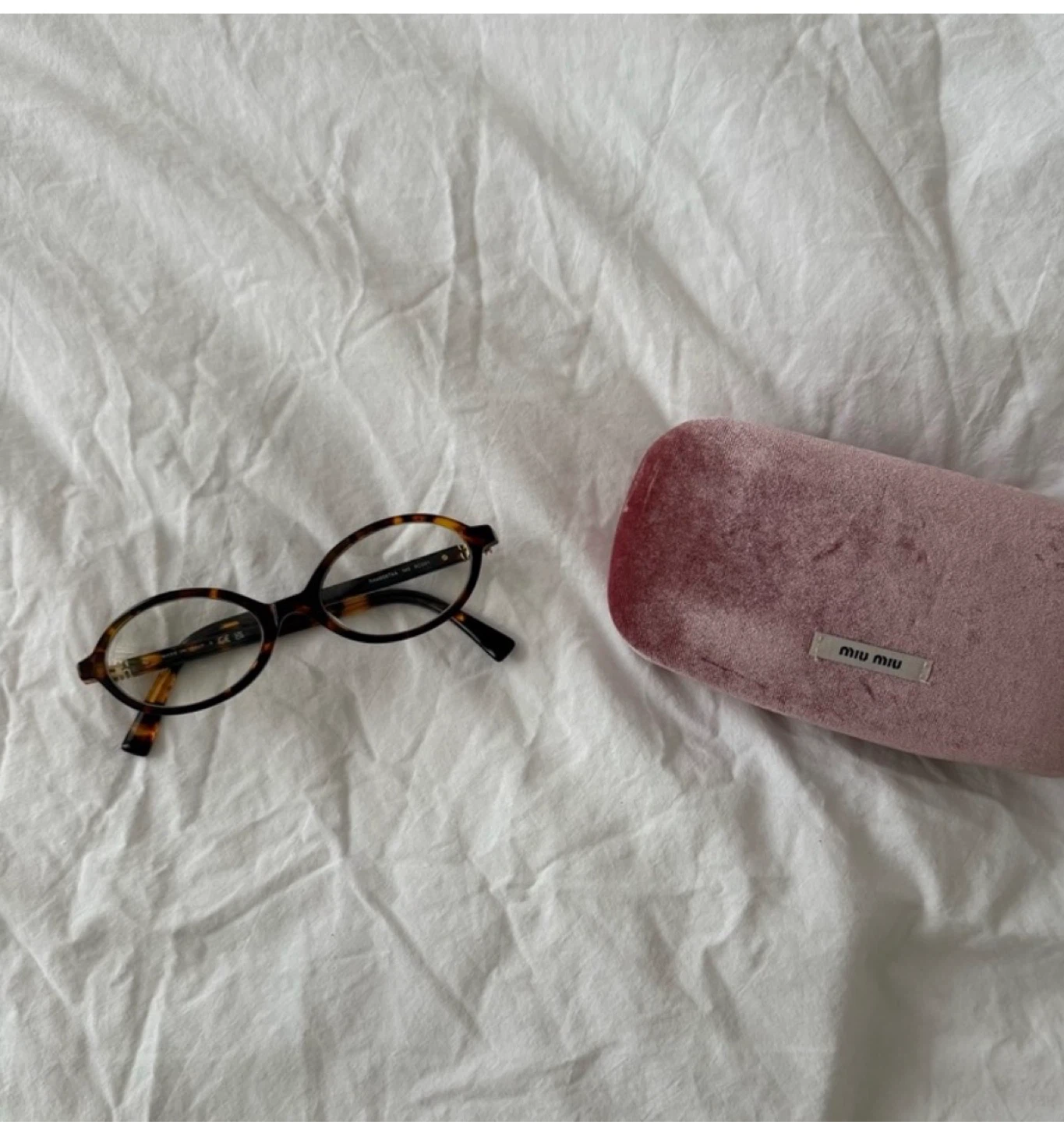 Miu Miu Tortoiseshell Oval Glasses with Velvet Case